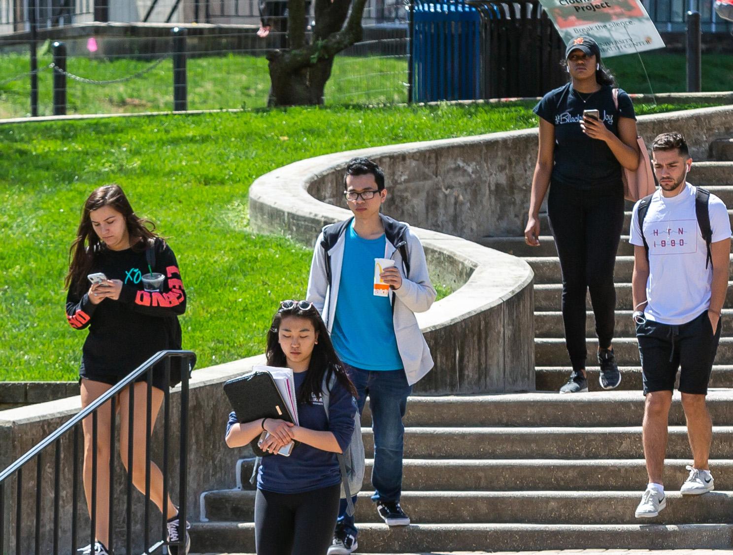 Students walking on steps outdoors